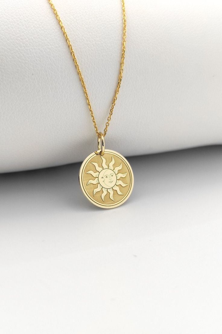 Welcome to ElegantGoldJewels,  Find all the information you need about your charm: Material of pendant: 14K Solid Gold Stamp: 585 (14K) Thickness: 0.5mm Jumpring Diameter: 4mm The pendant is available in 6 sizes: - 13mm / 0.52 inches - 15mm / 0.59 inches - 18mm / 0.70 inches - 20mm / 0.78 inches - 22mm / 0.86 inches - 24mm / 0.94 inches - 26mm / 1.02 inches - 28mm / 1.10 inches - 30mm / 1.18 inches Chains Information: Rolo Chain: -14K Real Gold - 0.70mm thick - Spring Ring Clasp - 16 inches / 40 Yellow Gold Moon Necklaces With Charms, Yellow Gold Moon-shaped Necklaces With Charms, Moon-shaped Yellow Gold Necklaces With Charms, Celestial Sun And Moon Charm Necklaces, Celestial Sun And Moon Charm Necklace, Celestial Engraved Round Pendant Charm Necklaces, Sun And Moon Design Charm Necklaces, Yellow Gold Moon Phase Charm Necklaces, Round Yellow Gold Charm Necklaces With Moon Phase