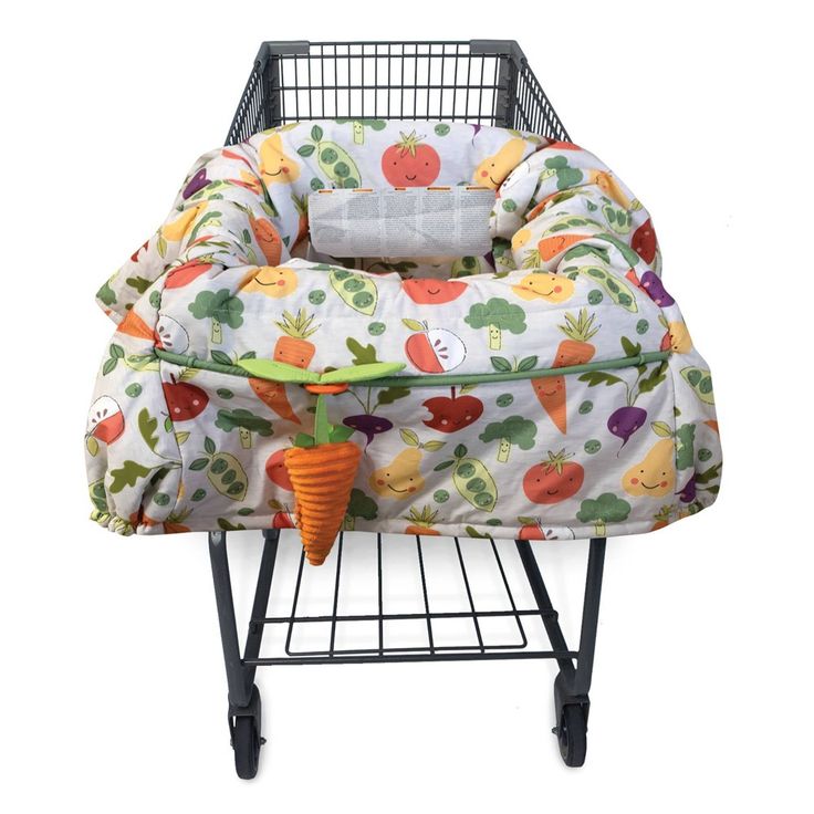 a baby bed with carrots and vegetables on it's back in a shopping cart