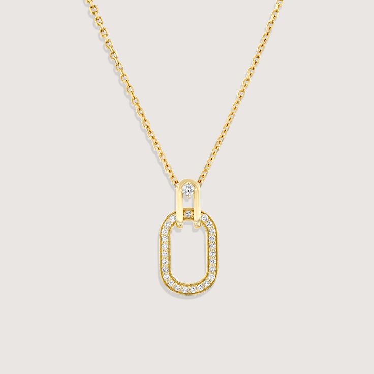 A gold chain and pendant, inspired by the interlinking of cufflinks, brings this necklace to life. As part of our Tailored Collection we studied all elements of suiting, and were fascinated by how a cufflink weaves itself through a button hole and connects to offer a practical yet beautiful finish. The oval pendant with diamond tracing hangs onto the chain with a hook that has a diamond at its center. The frame of the pendant measures 17mm and has 25 diamonds set within. If ordered in rose gold, the chain will be our Rollo chain. All features can be customized! Please contact us if you wish to make changes, we love making custom designs. All of our jewelry is carefully handmade in our atelier. *HC diamond are all conflict-free diamonds To order by phone 972-72-2991000 Gold Chain And Pendant, Chain And Pendant, Gold Chain With Pendant, Button Hole, Oval Pendant, Creative Arts, White Diamonds, Conflict Free Diamonds, Side View