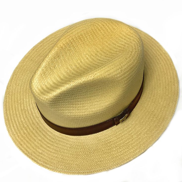 The Brooks was born a summer time staple. Looks great with the brim flipped up, down or half way, you can't go wrong either way. Made from super-fine toyo straw the lightweight and durable structure will block the sun and haters! 3" brim that can be flipped up or down. Non adjustable sweatband. Adjustable Beige Hats For Vacation, Straw Fedora With Uv Protection And Short Brim, Flat Brim Straw Hat For Travel And Vacation, Lightweight Summer Hat Bands For Travel, Adjustable Fedora For Travel And Vacation, Summer Travel Sun Hat Made Of Toquilla Straw, Summer Straw Hat With Flat Brim For Travel, Travel Straw Fedora With Uv Protection, Adjustable Straw Boater Hat For Travel