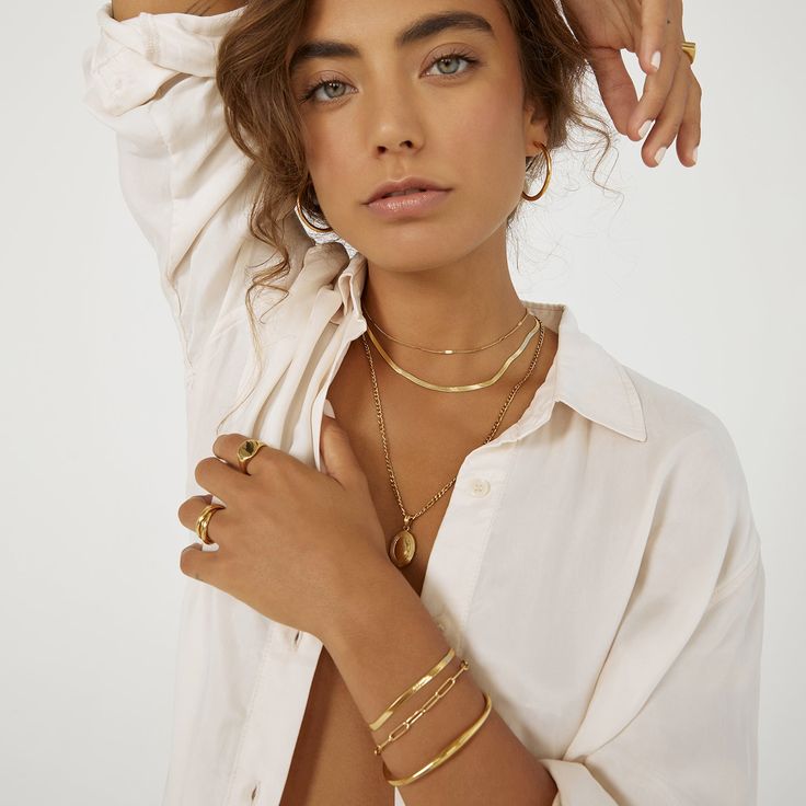 A truely elegant chain with a classy sense of style, our Willa Necklace is perfect for everyday sophistication! With 3 different length from a choker style to a long chain, Willa is designed to be stacked with any other gold or textured pieces to create the layering style of your dreams! 14k Gold (1 micron plating)  Stainless Steel Base  E-coating for a premium finish  Lead & Nickel Free  Tarnish-Free  Water Resistant Elegant Multi-strand Gold Plated Jewelry, Elegant Multi-strand Figaro Chain Jewelry, Elegant Multi-strand Delicate Chain Jewelry, Minimalist Snake Chain Layered Necklace, Elegant Multi-strand Necklaces For Everyday, Chic Layered Necklace With Figaro Chain, Minimalist Metal Jewelry With Figaro Chain, Chic Snake Chain Necklace, Minimalist Metal Figaro Chain Jewelry