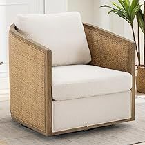 a white chair sitting on top of a rug next to a potted plant