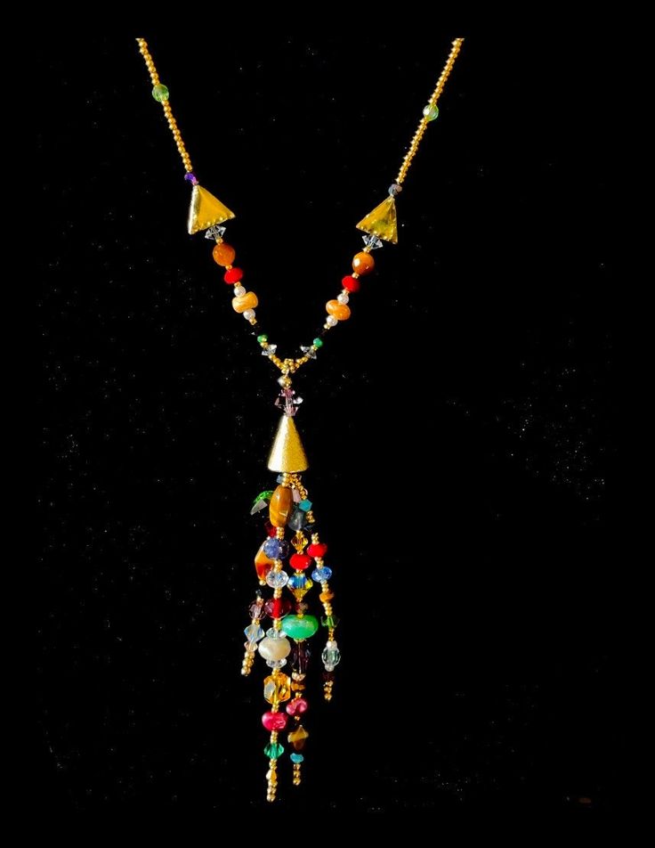 This necklace represents the stone and colors that adorn the gates of Heaven. This 21" necklace has sapphire, chalcedony, Swarovski emerald crystals, sardonyx, chrysolyte, topaz and amethyst. Beryl is represented by a Swarovski blue wing. 14kt gold-filled toggle clasp, and 24kt gold glass beads.  Simply beautiful!! The Gates Of Heaven, Gates Of Heaven, Blue Wings, 24kt Gold, Gold Glass, Toggle Clasp, Simply Beautiful, 14kt Gold, Topaz