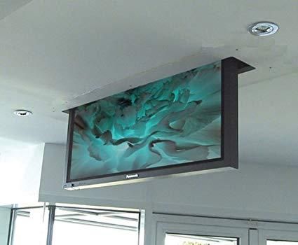 a flat screen tv hanging from the ceiling