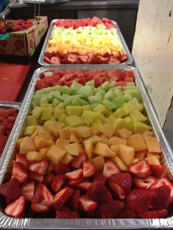 trays filled with different types of fruit