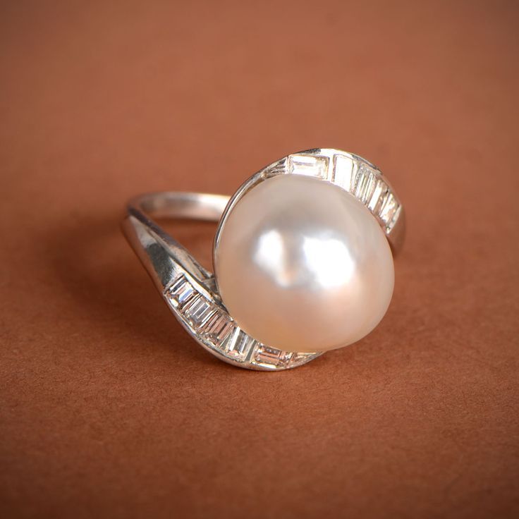 Classic Oval Pearl Ring With Diamond Accents, Timeless Oval Pearl Ring With Brilliant Cut, Classic Oval Pearl Ring With Center Stone, Classic Diamond Pearl Ring Hallmarked, Classic Oval Diamond Pearl Ring, Timeless Oval Pearl Ring For Wedding, Elegant Pearl Ring With Rose Cut Diamonds, Fine Jewelry Pearl Ring With Rose Cut Diamonds, Exquisite Pearl Ring With Diamond Accents And Oval Shape