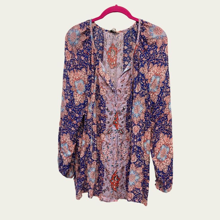 Boho And Breezy! So Pretty And The Colors Are So Easy To Style. Please Take A Look At All The Photos And Thank You So Much. Purple V-neck Blouse For Day Out, Purple Long Sleeve Spring Tunic, Purple Long Sleeve Tunic For Spring, Purple Bohemian Blouse For Fall, Blue Long Sleeve Blouse With Boho Print, Bohemian Purple Blouse For Fall, Boho Print Long Sleeve Beach Top, Purple Flowy Beach Top, Long Sleeve Boho Print Top For Beach