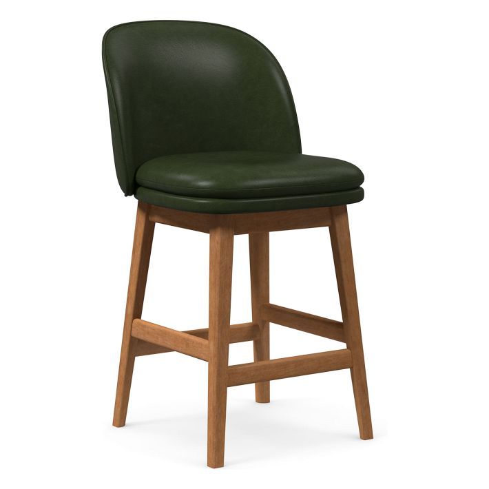 an upholstered bar stool with a wooden frame and green leather seat padding