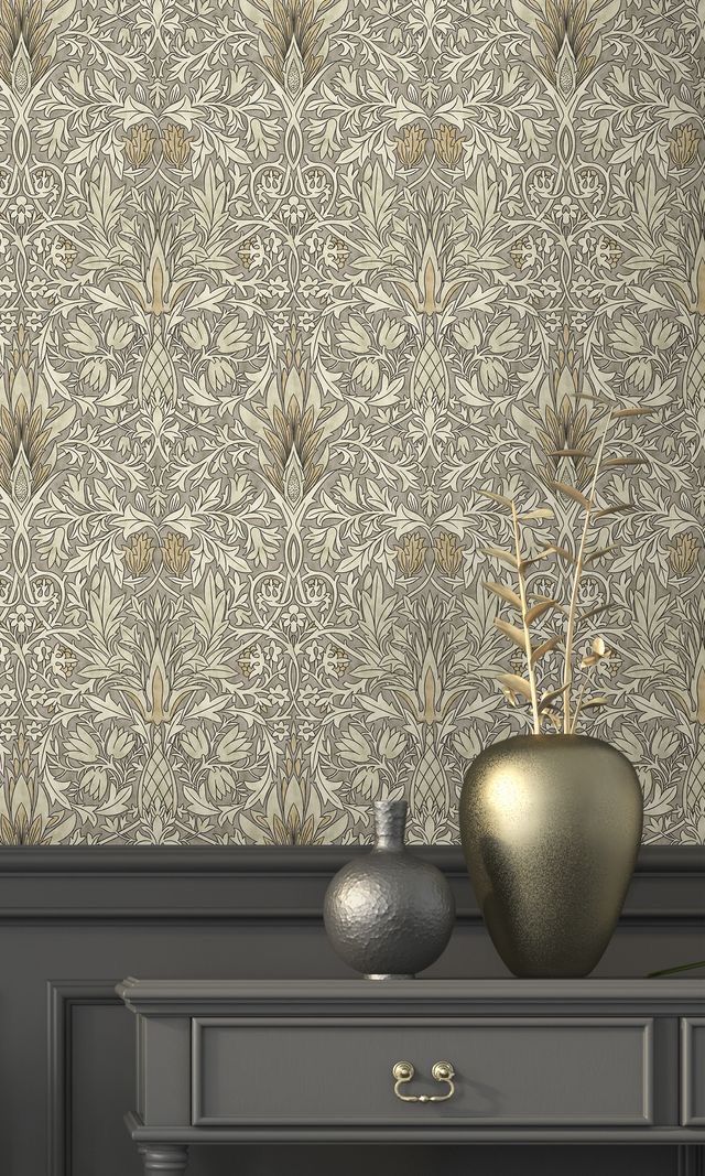 two vases are sitting on a table in front of a wallpapered background