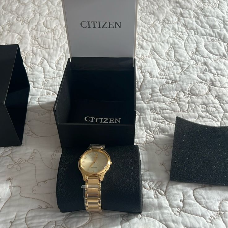 Nwt Gold Citizen Watch Comes With Original Box And Tags Yellow Gold Analog Watch For Gift, Yellow Gold Analog Jewelry And Watches As Gift, Timeless Watches With Box Clasp For Gift, Timeless Watches With Box Clasp As Gift, Elegant Analog Watch Accessories For Gift, Elegant Watches With Box Clasp, Modern Analog Jewelry And Watches For Gift, Modern Analog Jewelry And Watches Gift, Elegant Analog Jewelry And Watches For Gifts