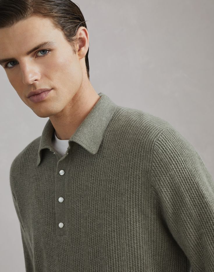 Cashmere textured rib knit polo with long sleeves This cashmere knit polo combines traditional workmanship, modern comfort and premium materials. The softness of the cashmere yarn, crafted in a textured ribbed knit, elevates the garment’s casual style, characterized by a comfortable, regular fit. Fall Polo Sweater With Textured Knit And Polo Collar, Fall Polo Collar Sweater With Textured Knit, Classic Textured Knit Polo Sweater For Fall, Knit Polo Sweater With Polo Collar For Winter, Elegant Ribbed Polo Sweater For Winter, Classic Long Sleeve Henley For Winter, Knit Polo Collar Sweater For Winter, Timeless Long Sleeve Wool Sweater, Classic Winter Polo Sweater With Ribbed Collar