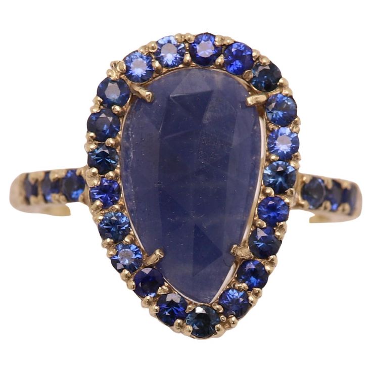 Vintage Blue Sapphire Ring - Hand Made in Italy 14k Yellow Gold 4.5 grams - mat finish (not shiny) Small Round Sapphires around the center. Center is a "sliced" type cut, approx size 14 x 8 mm Finger size 7.5 All stones are natural - Imperfections exist due to natural formation Included - gift box & Appraisal / Lab Certificate (semi #18_1930091) Vintage Blue Sapphire Ring, Vintage Sapphire Ring, Saphir Ring, Round Sapphire, Vintage Sapphire, Blue Sapphire Ring, Gem Ring, Blue Sapphire Rings, Cocktail Rings