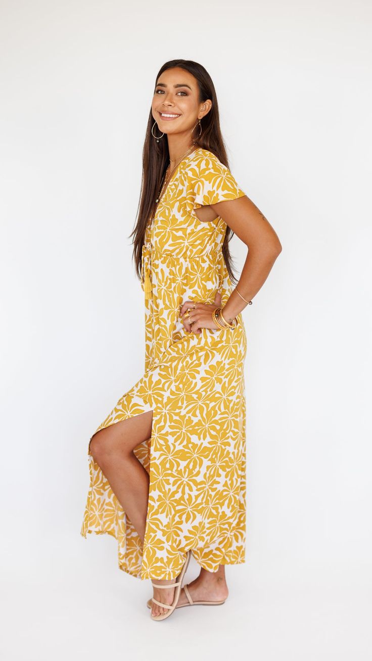 Complement the warmth of summer with an easy summer maxi dress to show your strong and feminine side. Our Leilani Maxi Dress subtly slims you down with its cap-sleeved, deep V-neckline, while the self-tying waist accentuates your curves effortlessly. Don't miss the side slits that'll let sashay around the city or the coast looking polished and relaxed at the same time. ** Our Model is 5'8" & wearing a size SMALL.** *Cap Sleeves *V neck *Maxi Dress *Side slits *Front tie details Fabric and Care I V Neck Maxi Dress, Mini Necklace, Summer Maxi, Easy Summer, Country Outfits, Summer Maxi Dress, Cap Sleeves, The City, Care Instructions