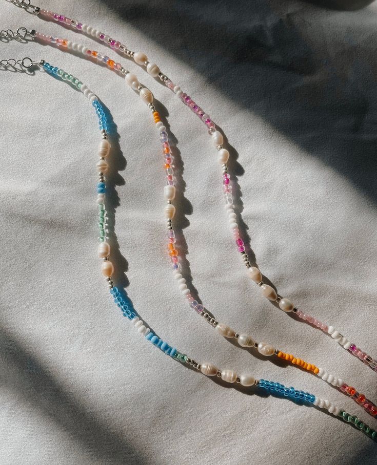 These coastal collection necklaces come in pink, multi sunset, and blue :) Perfect for summer and the beach! 20% of profits made will be donated to local women's health organizations. Coastal Grandma Jewelry, Beaded Beach Jewelry, Cute Beachy Jewelry, Multicolor Summer Jewelry, Adjustable Rainbow Beaded Necklaces For Summer, Summer Rainbow Beaded Necklaces, Summer Turquoise Necklace With Colorful Beads, Beachy Necklace With Colorful Beads As Gift, Beachy Necklace With Colorful Beads For Gift