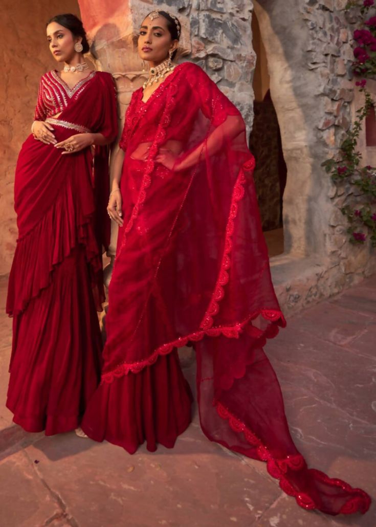 This gorgeous red drape sari in georgette with crinkle detailing is paired with fully embroidered sequins and beaded blouse. The blouse is padded, have side zip closure and have a flattering v-neck line. The outfit is paired with embroidered belt. Drape Sari, Red Drapes, Embroidered Belt, Beaded Blouse, Custom Tailoring, Asian Fashion, Side Zip, Custom Sizing, Sleeve Length