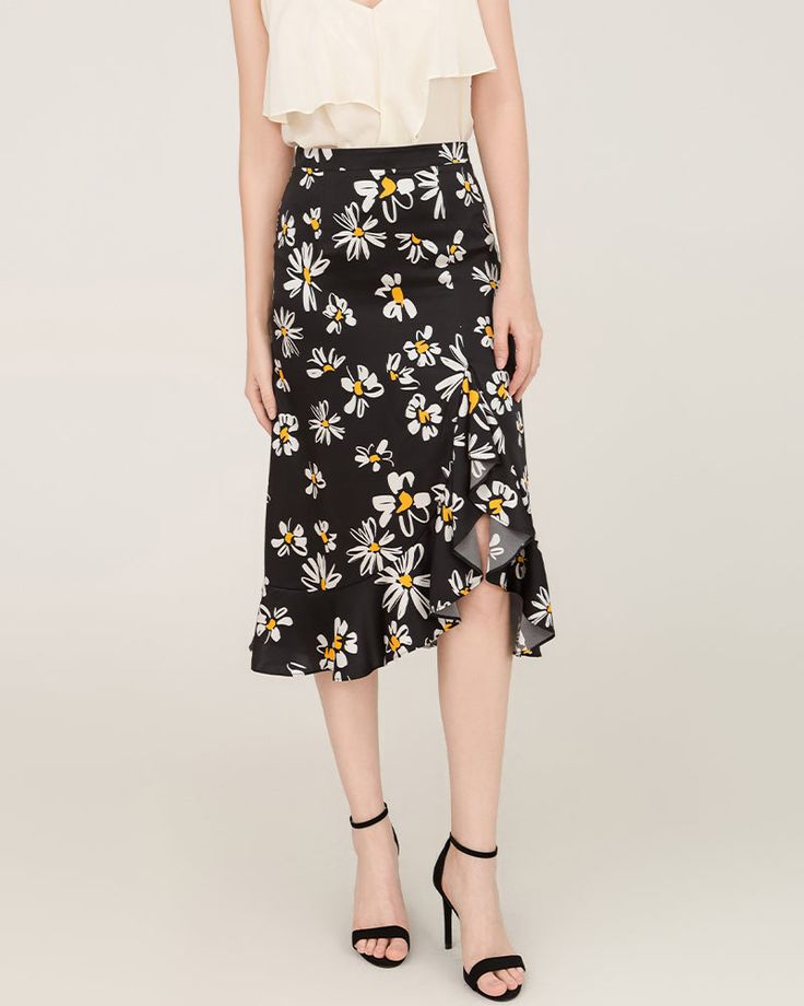 Type: Women's Silk SkirtMaterial: 19 Momme Luxury Mulberry Silk. Details:Elegance meets playful charm with our Silk Black Base White Daisy Irregular Hem Skirt. Crafted from premium silk, this unique piece adds a touch of sophistication and a hint of whimsy to your wardrobe. Timeless Beauty: The classic black background adorned with white daisy accents creates a look that's effortlessly timeless. Irresistible Silk: Made from high-quality silk, this skirt feels exquisite against your skin and drap Spring Midi Draped Pleated Skirt, Spring Asymmetrical Draped Pleated Skirt, Chic Flowy Draped Skirt For Spring, Asymmetrical Pleated Draped Skirt For Spring, Chic Knee-length Draped Skirt For Summer, Chic Spring Lined Draped Skirt, Asymmetrical Skirt For Spring Party, Spring Midi Draped Skirt, Spring Midi Draped Skirt With Relaxed Fit