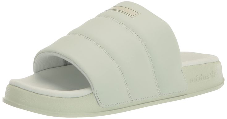 PRICES MAY VARY. Women's slides with a sleek look and comfortable build LIGHTWEIGHT COMFORT: Synthetic upper for durability and light weight SYNTHETIC OUTSOLE: A durable synthetic outsole provides traction TEXTILE LINING: Textile lining provides a soft, comfortable feel Affordable Sporty Flat Slides, Adidas White Flat Slides, White Synthetic Adidas Slides, White Non-slip Adidas Slides, Adidas Non-slip Slides, Adidas Non-slip Beach Slides, Adidas Originals Women, Womens Slides, Sport Sandals