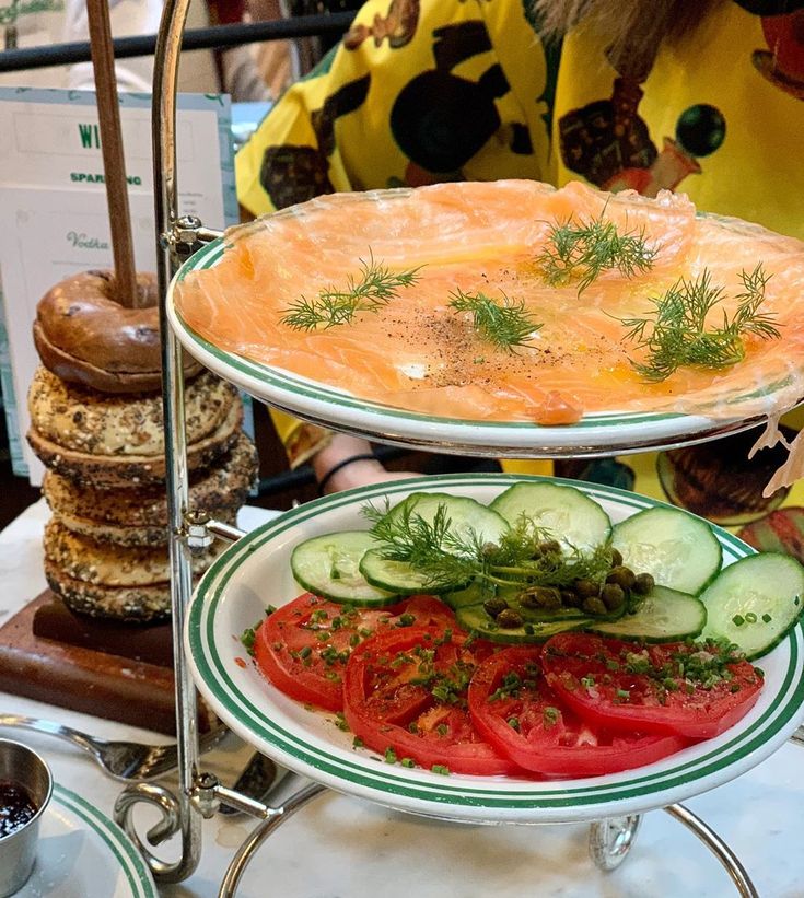 two plates filled with food on top of a table