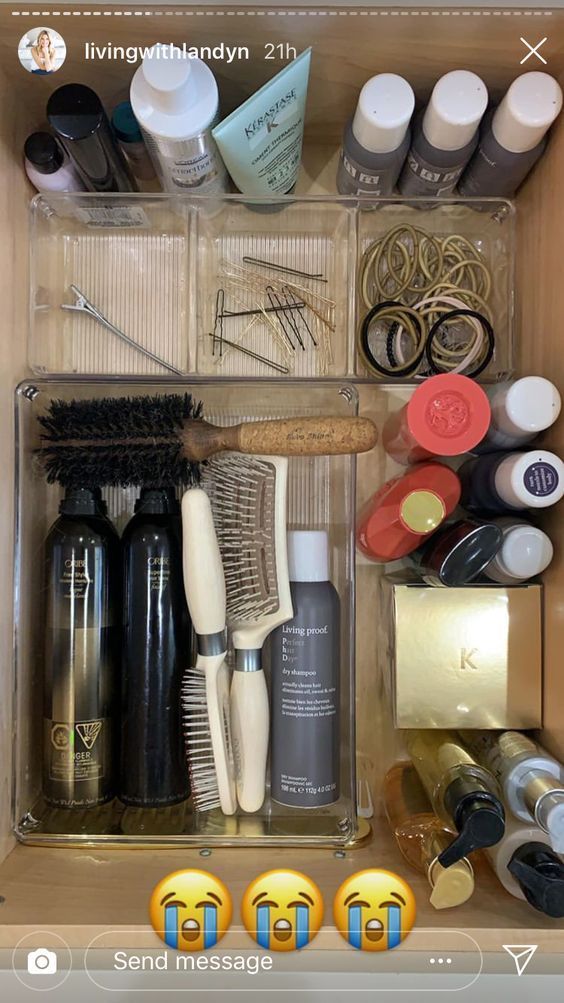 an open drawer containing various beauty products and hairbrushes in it, with text overlaying the image