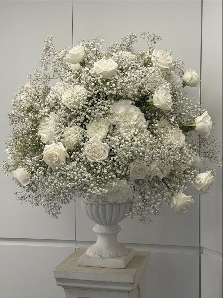 Gypsophila urn with roses White Flowers Decoration Wedding, Gypsophila And Roses Wedding, Gypsophila Wedding Aisle, Floral Wall For Wedding, Gypsophila And Roses Wedding Decoration, White Hydrangea Wedding Decor, Gypsofilia Wedding Decor, White Roses And Gypsophila Wedding, Simple Church Wedding Decorations