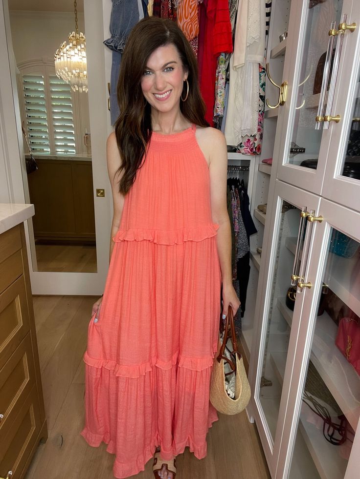 Get ready to dream of summer in our Summer Dream Maxi Dress! Made with lightweight, airy fabric, this gorgeous coral dress has that effortless feel and features a tiered body with ruffle trim. Add a slicked back ponytail or bun and pair with sandals or wedges for the perfect summer look. Carefree, chic, and easy - it's the perfect summer dress! This if fully lined. Strap length can be adjusted in the back. Dress measures 53" in length. Bust measures 22" from underarm seam to seam. Measurements t Sleeveless Tiered Dress For Summer Daywear, Casual Summer Tiered Dress For Brunch, Summer Daywear Maxi Dress With Ruffle Hem, Summer Maxi Dress With Ruffle Hem For Daywear, Flowy Summer Tiered Dress For Day Out, Flowy Tiered Summer Dress For Day Out, Flowy Tiered Dress For A Summer Day Out, Casual Tiered Ruffle Dress For Beach, Casual Tiered Dress For Beach