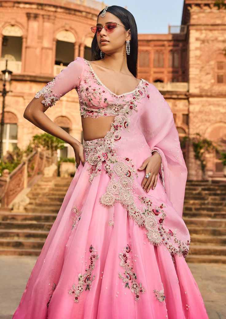 Pink lehenga set with thread work and pearl embroidery. Organza Choli With Mirror Work, Wedding Palazzo Set With Dori Work For Diwali, Floor-length Sets With Intricate Embroidery For Navratri, Navratri Sets With Intricate Embroidery In Floor-length, Organza Palazzo Set With Dori Work For Navratri, Navratri Organza Palazzo Set With Dori Work, Traditional Organza Palazzo Set With Dori Work, Intricate Embroidery Raw Silk Lehenga, Semi-stitched Organza Lehenga In Traditional Drape