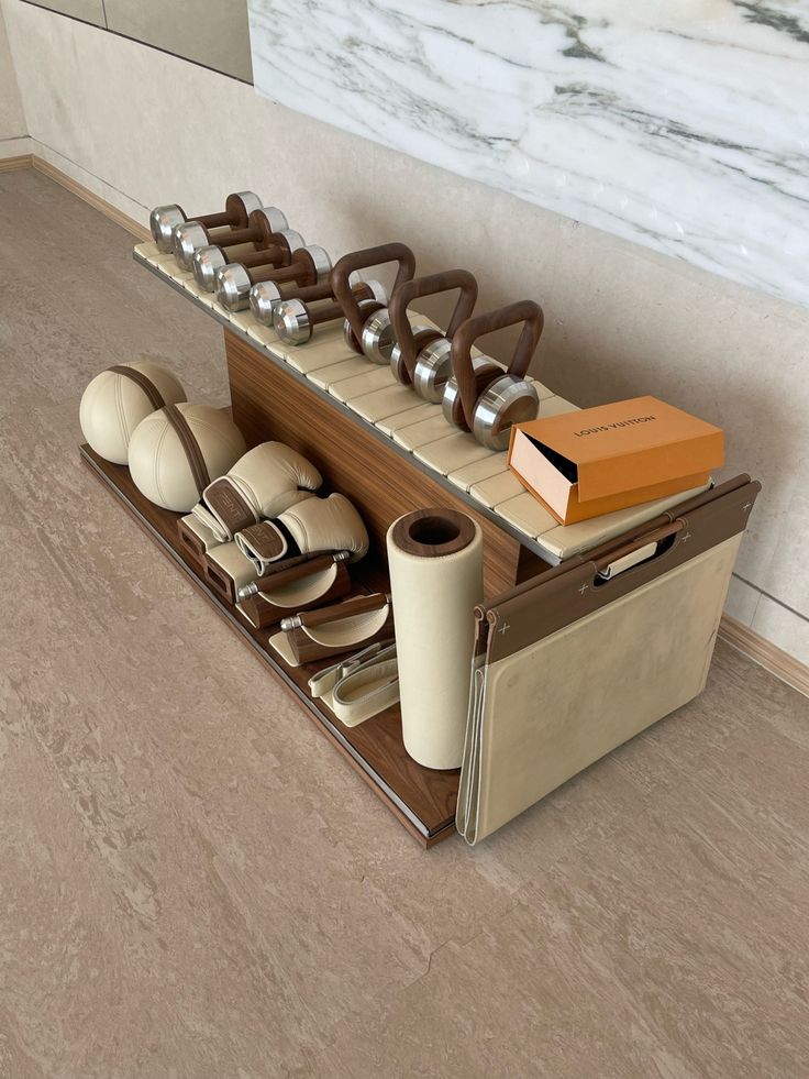 an assortment of shoes and other items are on display in a room with marble walls