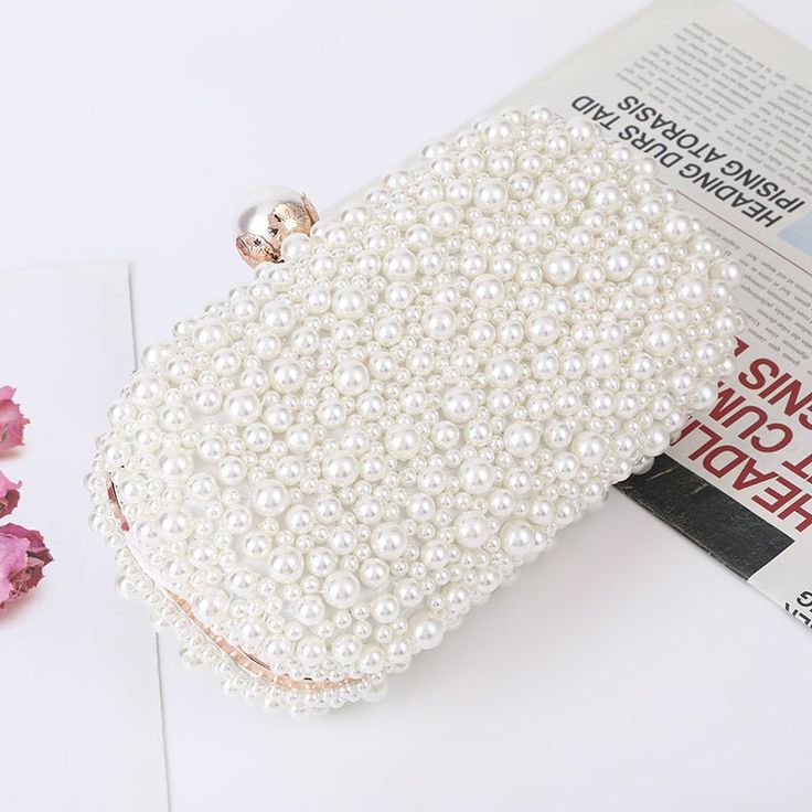 Meet our royal pearl clutch collection Unlimited handmade bead clutch evening pearl bag to finish off your outfit. Perfect as a bridesmaid bag, Soft and elegant you can give your bridesmaids the ultimate perfect pouch! Decoration: Pearl Lining Material: Polyester Wedding Clutch Bag, Pearl Clutch Bag, Satin Texture, Pearl Clutch, Clutch Bag Wedding, Soft Face, Buy Pearls, Lock Style, Wedding Clutch