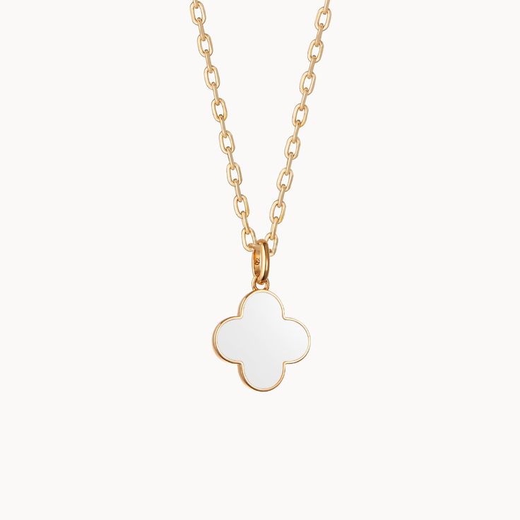 Colorful and pretty, our Personalized Enamel Clover Cross Necklace is a little token of luck to elevate any jewelry collection. This beautiful clover necklace is available in three eye-catching enamel colors. Each cross necklace be made into a lovely personalized gift by hand-engraving a special name onto the reverse of your charm.&nbsp;18K Champagne Gold Plated or 925 Sterling SilverCharm: 0.55x0.55&nbsp;Secure clasp fasteningCharms are removable from this chain and can be worn on all M Crystal Dice, Birth Gift, Clover Necklace, Grandmother Gifts, Crystal Stars, Engraved Necklace, Champagne Gold, White Enamel, Gifts For New Moms