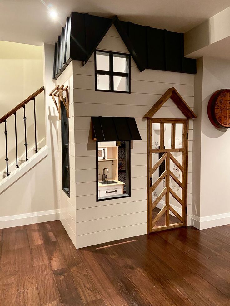 Indoor playhouse built under the stairsmodernfarmhousedecor playhouse playhouseideas playhousediy Under Stairs Playhouse Diy, Small Indoor Playhouse, Understairs Play House, Playhouse Inside Ideas, Indoor Play Houses, Playhouse In Playroom, Play House Under Stairs, Diy Playhouse Indoor, Built In Playhouse Indoor