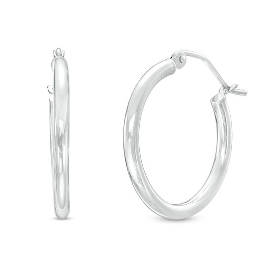 Dressed up or down, these 14K white gold hoop earrings are a classic fashion choice that complements any attire with ease. Created in 14K white gold Each earring features a 20.0mm-wide tubular hoop gleaming with a bright polish. These earrings secure with latch backs. Classic White Hoop Earrings In Sterling Silver, Classic White Sterling Silver Hoop Earrings, White Hypoallergenic Classic Hoop Earrings, Classic White Hypoallergenic Hoop Earrings, Classic White Hoop Earrings With Polished Finish, Classic Sterling Silver Hoop Earrings With Ear Wire, Classic White Small Hoop Earrings, Minimalist White Gold Hoop Earrings For Formal Occasions, Classic Sterling Silver Hoop Earrings