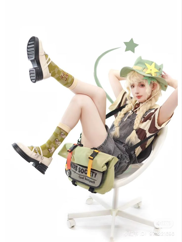 a woman is sitting in a chair with her legs crossed and wearing green boots, holding a purse