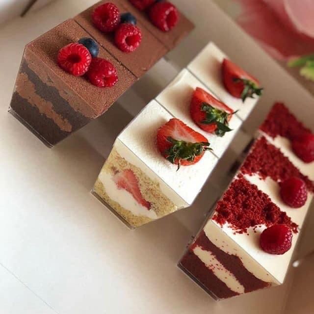 four different types of desserts are arranged on a table