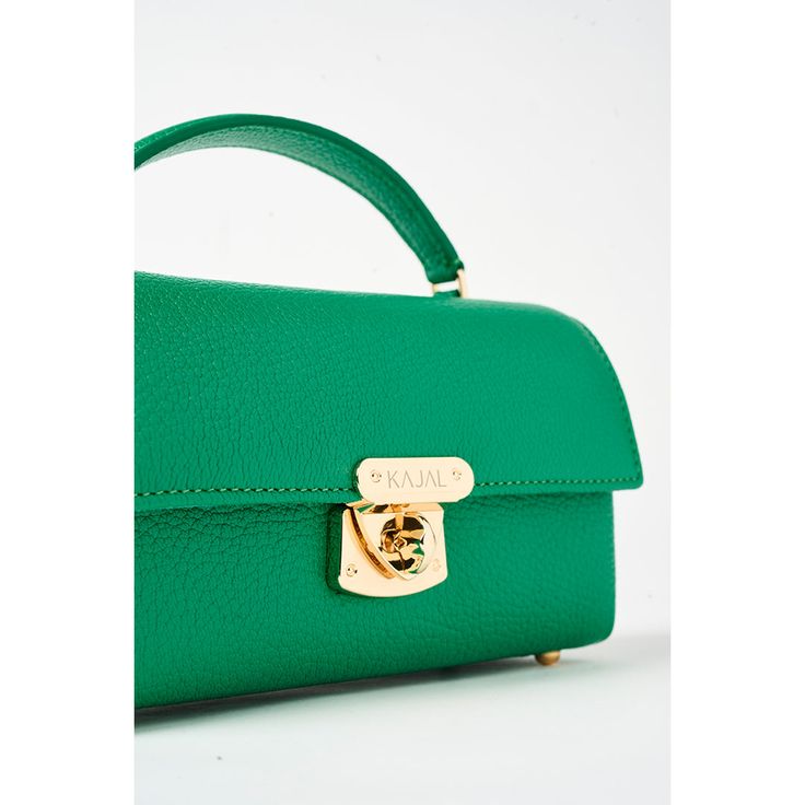 GREEN LEATHER MINI BAG WITH MIRROR AND GOLD CHAIN DETAIL Style this bag in 4 different ways to complement any outfit! Transition seamlessly from day to night by wearing it as a cross-body, shoulder bag, belt bag, or clutch. Create a unique look to match your outfit! Designed in NYC, Made in Italy. Material Vegetable-Tanned Leather sustainably made in Italy. The leather is tanned the natural way using plant extracts and no harsh chemicals. By repurposing byproducts from the meat industry, we are Luxury Green Shoulder Box Bag, Luxury Green Box Bag, Luxury Green Top Handle Box Bag, Designer Green Box Bag With Gold-tone Hardware, Luxury Green Flap Bag With Detachable Handle, Luxury Green Top Handle Flap Bag, Luxury Green Mobile Phone Bag, Luxury Green Satchel Flap Bag, Luxury Green Box Bag For Formal Occasions