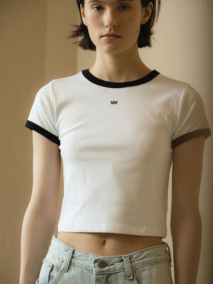 This is a trendy and unique t-shirt by MORCEAU PAR MORCEAU that is made out of high quality and sturdy material. With distinctive mood of the design and feminine look, you can style it for your trendy and casual daily outfit.- Soft and elastic touch of cotton blend fabric- Minimal logo print detail- Cropped and slim silhouette White Cotton Crew Neck Cropped T-shirt, White Cropped T-shirt With Crew Neck, Modern White T-shirt For Everyday, White Cropped T-shirt For Everyday Summer Wear, White Cotton Cropped T-shirt For Everyday, Basic White Cotton Top, Everyday White Cotton Cropped T-shirt, White Sporty Cropped T-shirt For Spring, White Casual Cropped T-shirt For Streetwear