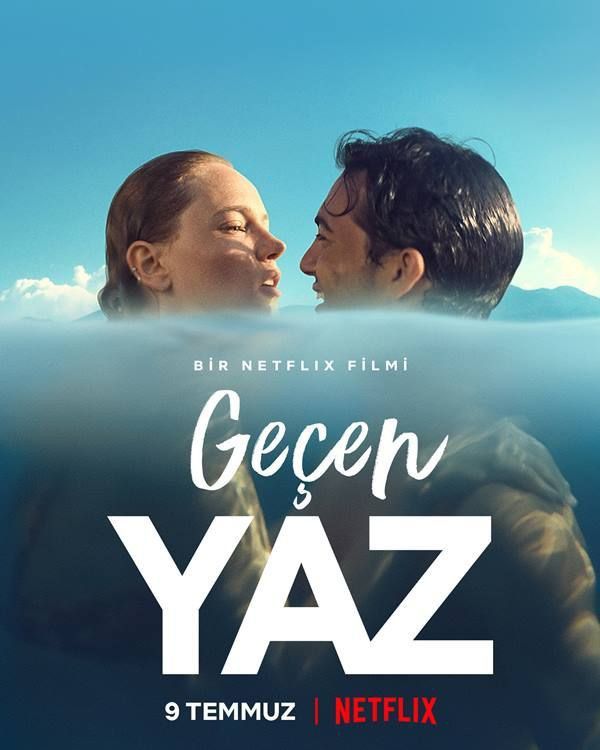 the movie poster for geeen yaz with two people kissing in front of water