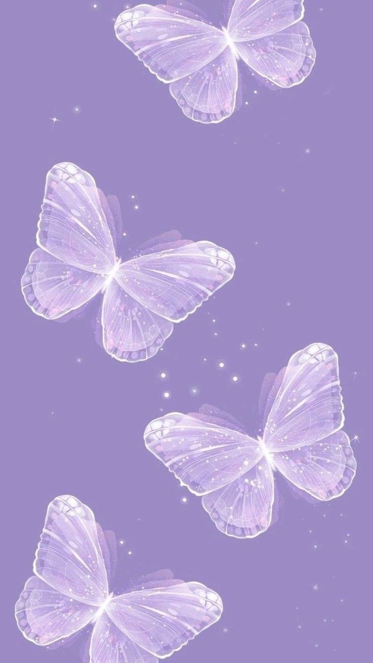 three purple butterflies flying in the sky with stars on them and one is white, while the