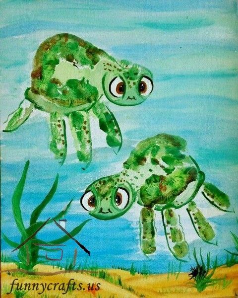 two green sea turtles swimming in the ocean with algaes on their backs and eyes