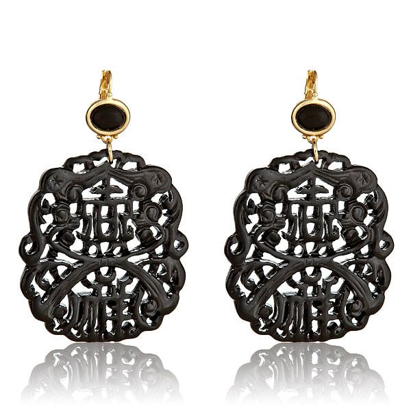 Kenneth Jay Lane Black Carved Earrings at HAUTEheadquarters.com Black Plug Earrings For Party, Black Filigree Earrings, Black Filigree Earrings For Gift, Black Filigree Earrings As Gift, Formal Black Filigree Earrings, Elegant Black Filigree Earrings, Black Pierced Earrings For Evening, Black Onyx Earrings For Parties, Light Earrings