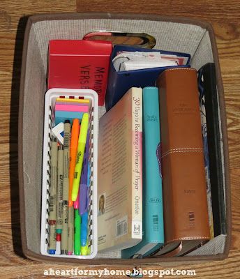 an open suitcase filled with books and school supplies