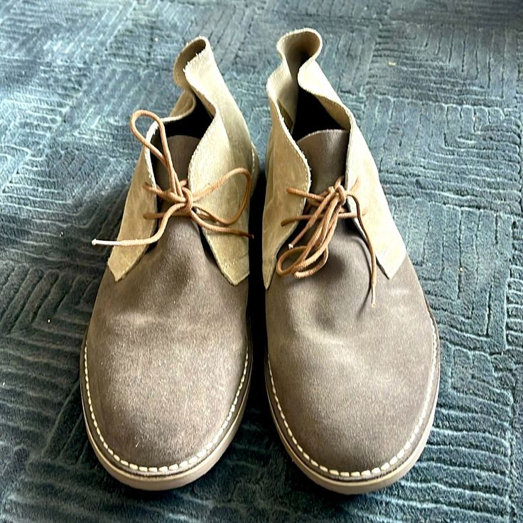 Never Worn, Excellent Condition Brown Chukka Boots With Textured Sole And Round Toe, Brown Chukka Boots With Textured Sole, Casual Beige Leather Shoes With Plain Toe, Beige Plain Toe Casual Leather Shoes, Casual Beige Plain Toe Leather Shoes, Masculine Suede Shoes With Leather Footbed, Brown Suede Desert Boots With Textured Sole, Brown Desert Boots With Textured Sole & Moc Toe, Brown Lace-up Desert Boots With Stitched Sole