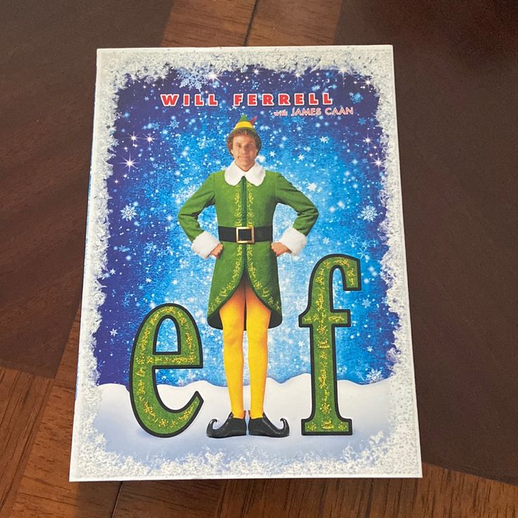 an elf is standing in the snow with his hands on his hips and legs crossed