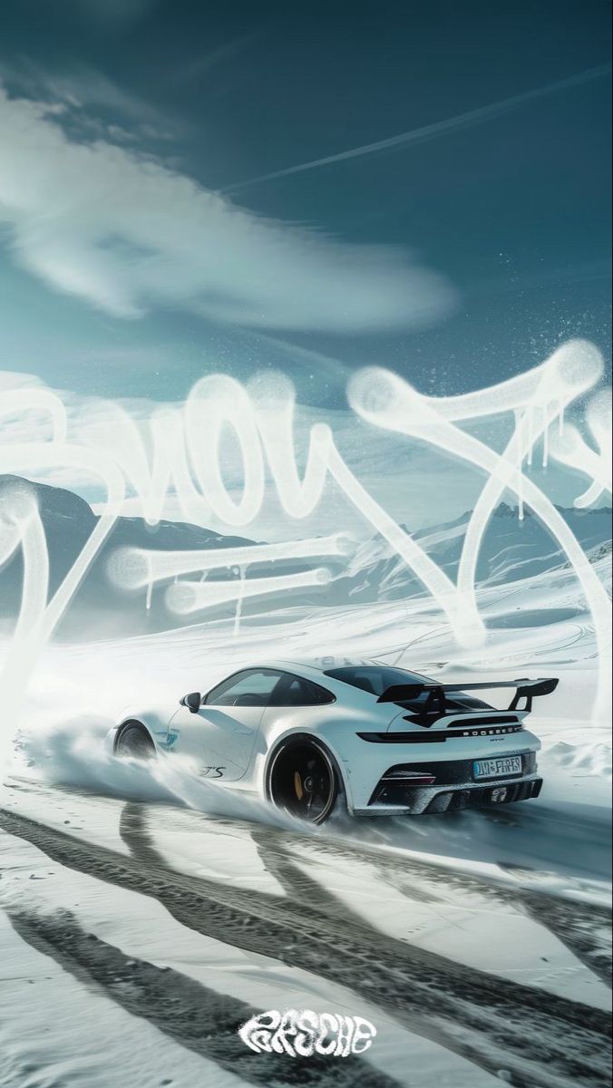 a white sports car driving down a snow covered road next to the word slowdown