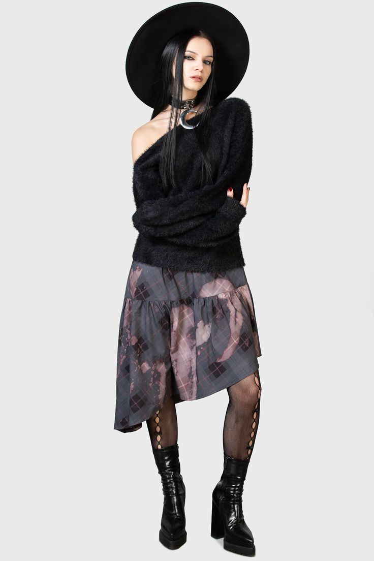 OTHALO'S RUIN.- Soft, stretch fabric.- Asymmetric hem.- Elasticated waistband.- Rushed details.- Midi length.- Fitted.With KILLSTAR branding, 96% Polyester, 4% Elastane.Machine wash cold (30°c) / Do not bleach / Do not tumble dry / Iron at low temperature / Do not dry clean. Imported. Edgy Black Asymmetrical Mini Skirt, Gothic Asymmetrical Hem Skirt, Edgy Asymmetrical Skirt For Alternative Fashion, Edgy Skirt For Alternative Fashion In Fall, Asymmetrical Hem Stretch Skirt For Fall, Stretch Skirt With Asymmetrical Hem For Fall, Fall Asymmetrical Hem Stretch Skirt, Gothic Black Bottoms With Asymmetrical Hem, Gothic Asymmetrical Hem Bottoms For Spring