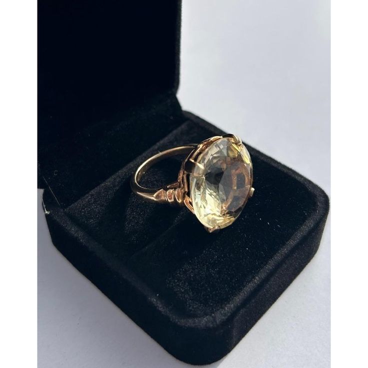 This is part of Chairish’s Fine Jewelry assortment.  Stylish Round Yellow Topaz, Vintage 14k Yellow Gold Large Cocktail Ring. Ring size 6.5 in. Stone: 19.5 mm x 19.6 mm x 10.2 mm Weight of Ring: 9.6 grams The Round cut Yellow Topaz is a large stone, estimated at 23 carats, securely set into a high rising mount that is designed to show the beauty of the gemstone.  If you would like more information, please contact me via email, mrboult@gmail.com. Formal Citrine Birthstone Ring In Fine Jewelry Style, Formal Fine Jewelry Citrine Birthstone Ring, Citrine Birthstone Ring For Formal Occasions, Timeless Topaz Jewelry For Formal Occasions, Formal Timeless Topaz Jewelry, Classic Topaz Crystal Ring With Gemstone, Formal Topaz Ring With Citrine Center Stone, Hallmarked Oval Yellow Gold Crystal Ring, Hallmarked Yellow Gold Oval Crystal Ring