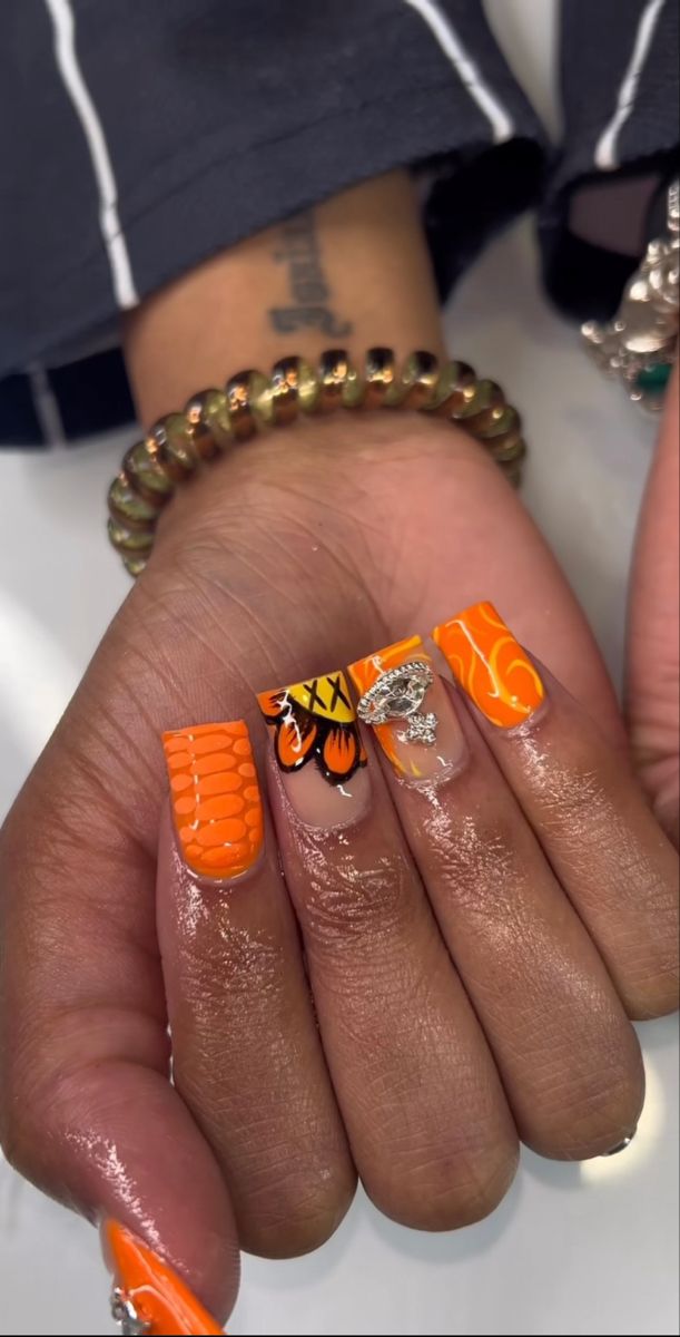 Cute Acrylic Toes Design, Orange And Silver Nails Prom, Cute Short Nail Sets Orange, Orange Kaws Nails, Orange Nails Acrylic Design, Orange Acrylic Nails Designs, Short Orange Acrylic Nails, Shorties Nail Designs, Short Orange Nails