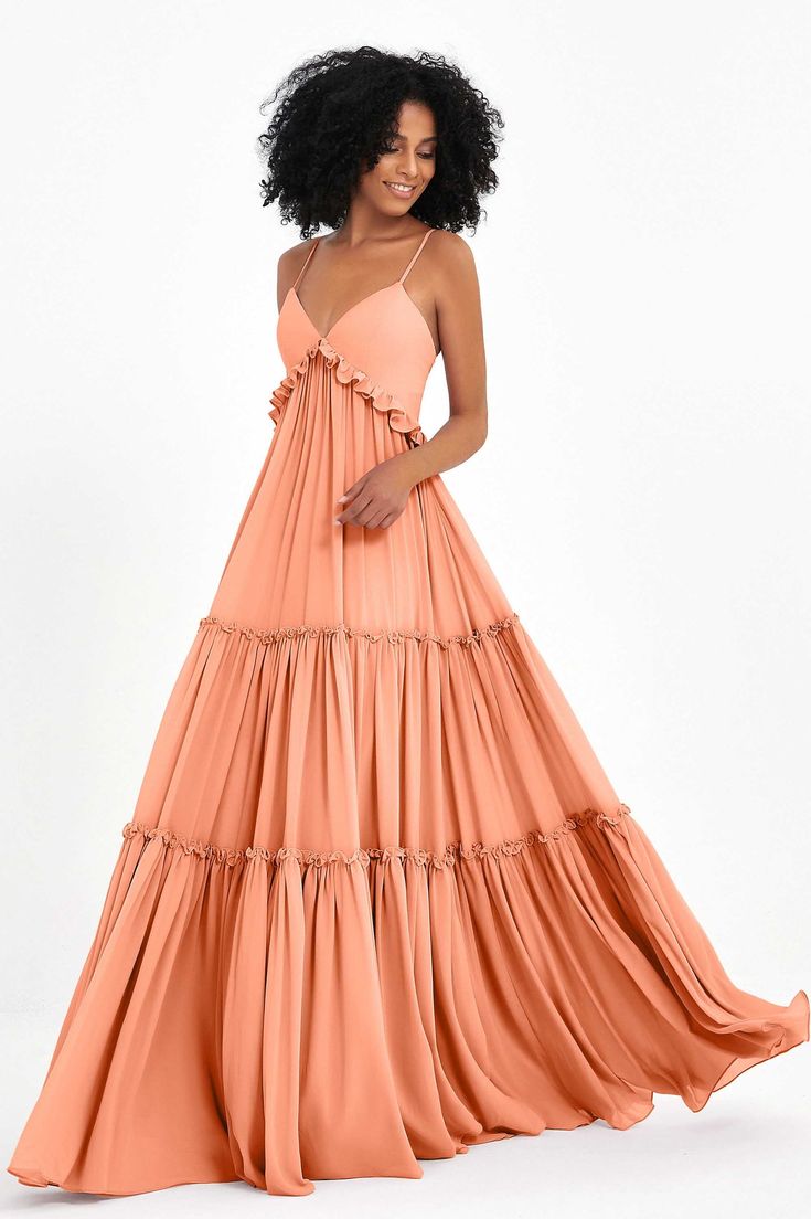 Elegant Evening Dress With Ruffles And Spaghetti Straps, Elegant Evening Dress With Spaghetti Straps And Ruffles, Elegant Spaghetti Strap Evening Dress With Ruffles, Flowy Ruffled Maxi Dress For Prom, Elegant Tiered Ruffled Evening Dress, Flowy Party Dress With Adjustable Straps, Party Dress With Adjustable Straps And Flowy Fit, Flowy Ruffled Maxi Dress For Prom Season, Tiered Ruffle Maxi Dress For Prom