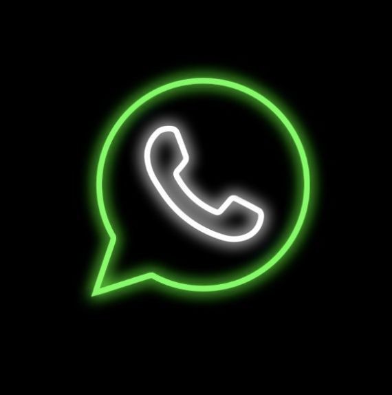 a neon green phone with the text whatsapp on it in a speech bubble