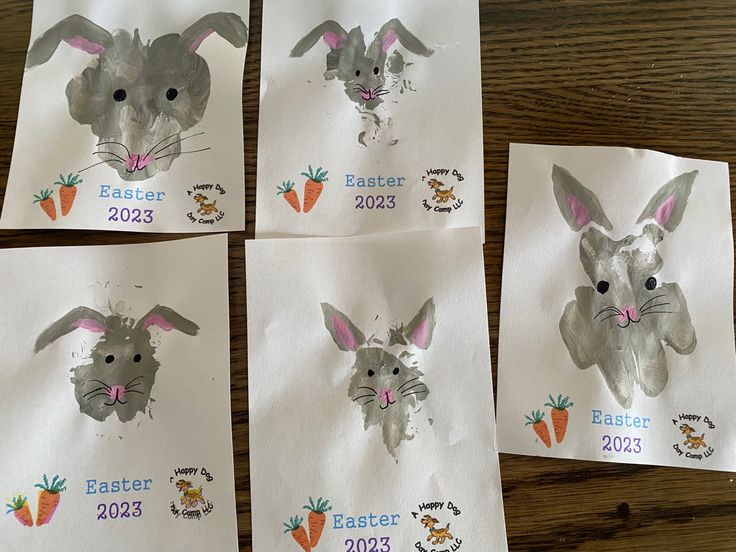 four handmade easter cards with pictures of rabbits and carrots