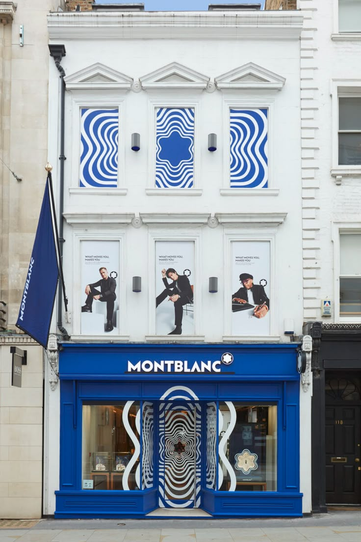 the front of montblanc's store in an urban area with blue and white architecture